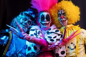 3 colorful scary clowns in horror make up